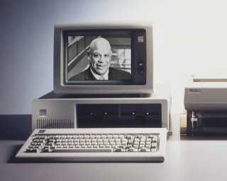 portrait of Mark Dean on the IBM original PC